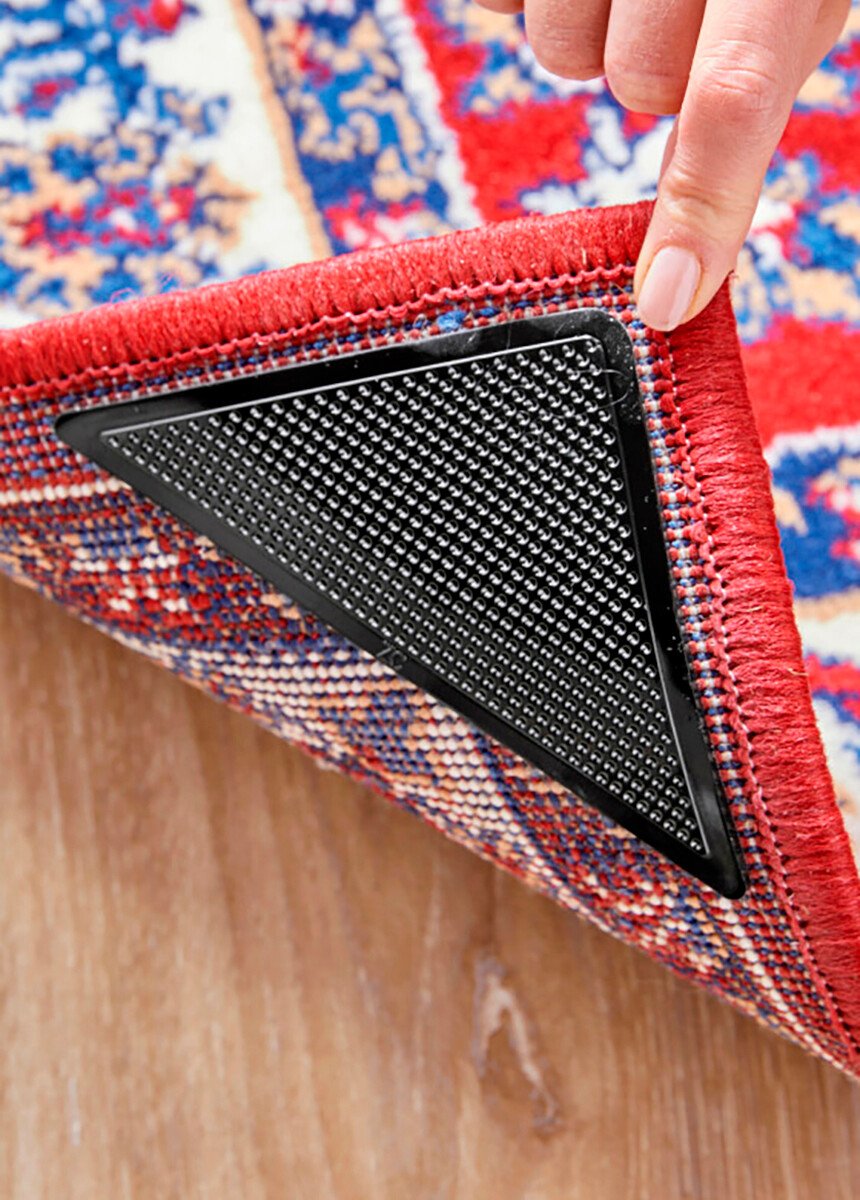 Esquinas_adhesivas_para_alfombras_-_juego_de_4_Negro_FA1_slim