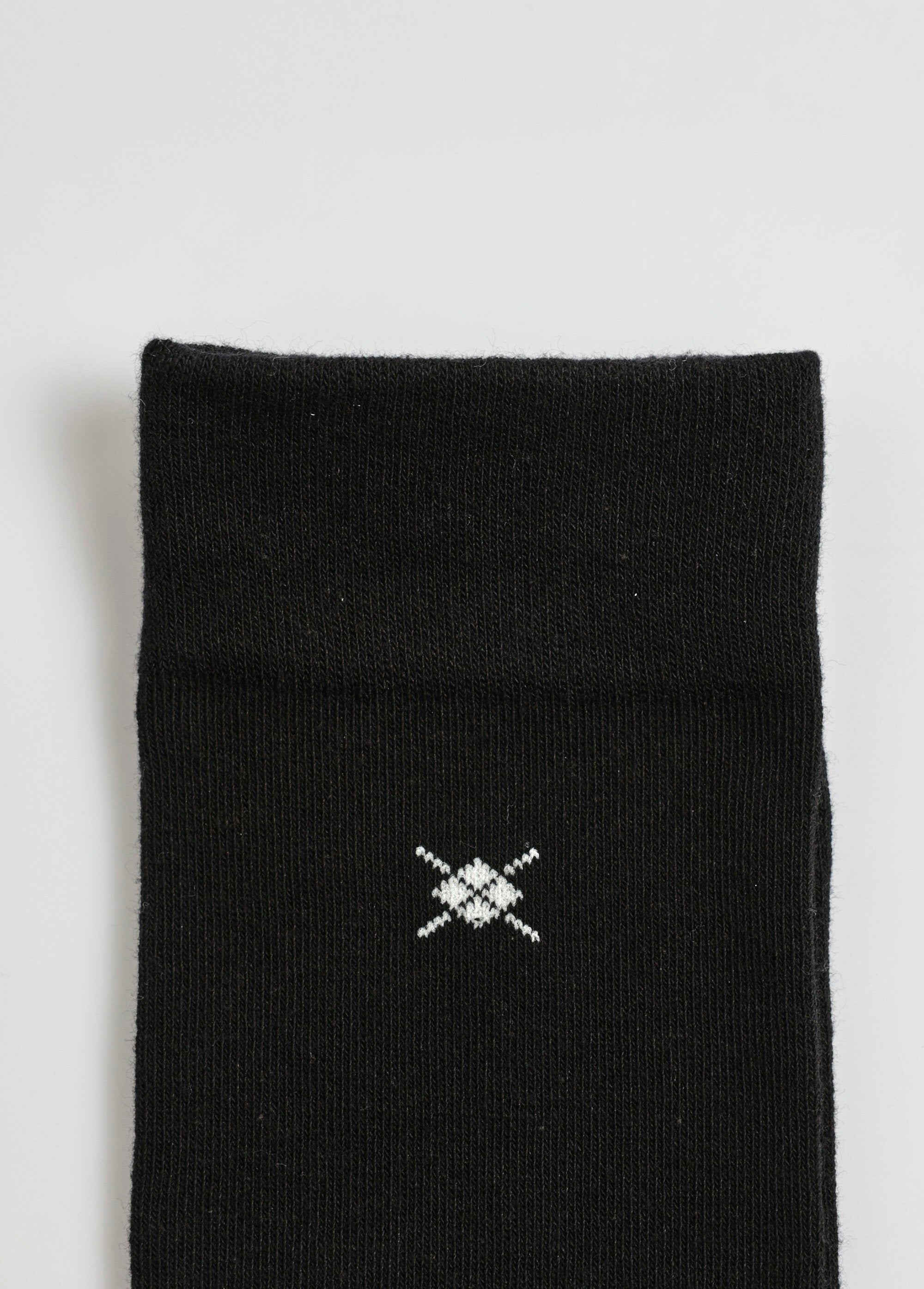 Par_de_calcetines_con_pequeños_estampados_Negro_a_juego_DE3_slim